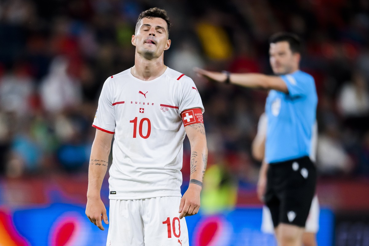 epa09992719 Switzerland's midfielder Granit Xhaka reacts during during the UEFA Nations League soccer match between Czech Republic and Switzerland at Sinobo Stadium in Prague, Czech Republic, 02  ...