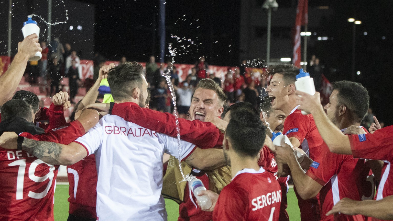 Gibraltar players celebrate at the end of the UEFA Nations League soccer match between Gibraltar and Liechtenstein at the Victoria Stadium in Gibraltar, Tuesday Oct. 16, 2018. Gibraltar beat Liechtens ...