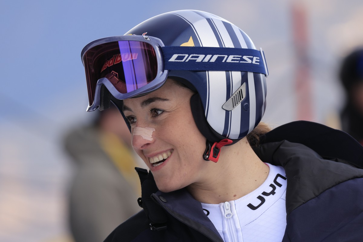 Italy's Sofia Goggia smiles ahead of an alpine ski, women's World Cup downhill training, in Garmisch-Partenkirchen, Germany, Friday, Jan. 24, 2025. (AP Photo/Giovanni Maria Pizzato)