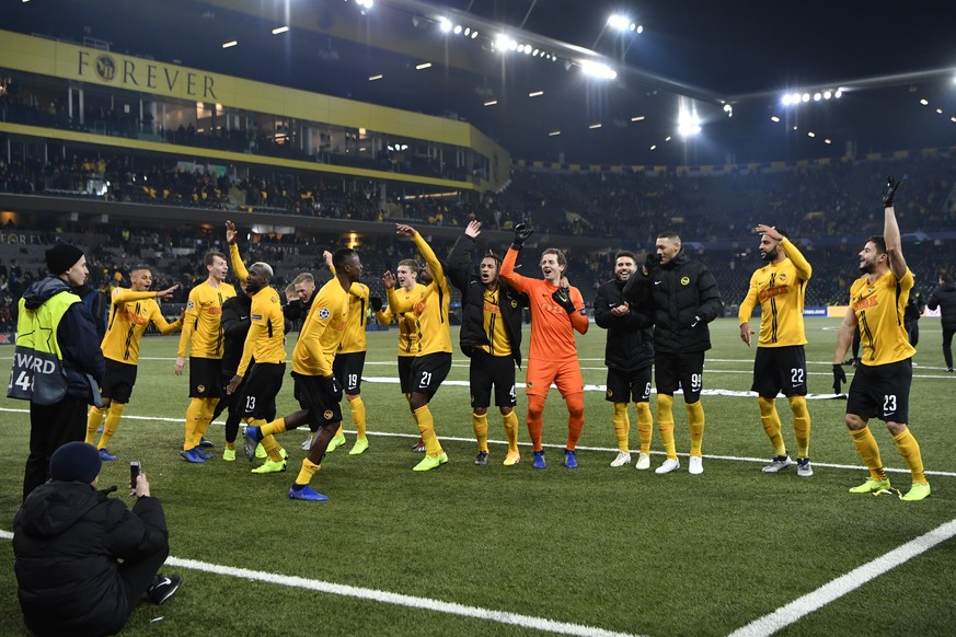 The Young Boys celebrate after winning the UEFA Champions League group stage group H matchday 6 soccer match between Switzerland's BSC Young Boys Bern and Italy's Juventus Football Club Turin, at the  ...