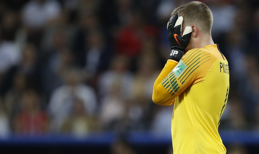 England goalkeeper Jordan Pickford reacts during the semifinal match between Croatia and England at the 2018 soccer World Cup in the Luzhniki Stadium in Moscow, Russia, Wednesday, July 11, 2018. (AP P ...