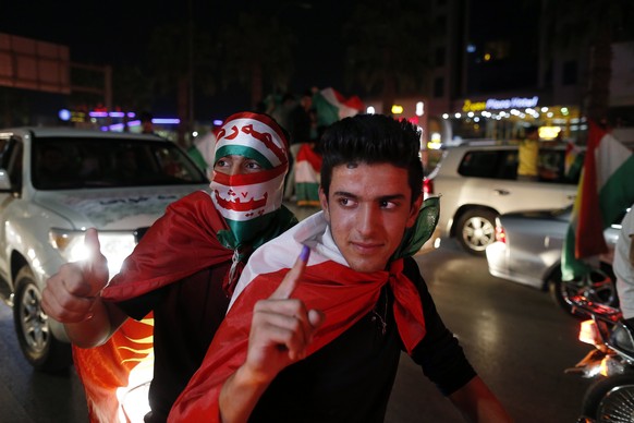 epa06227014 Kurds celebrate to show their support for the independence referendum in in Erbil, Kurdistan region in northern Iraq, 25 September 2017. The Kurdistan region is an autonomous region in nor ...