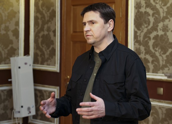 Mykhailo Podolyak, adviser to the Ukrainian Presidential office and member of the Ukrainian delegation gestures while speaking to the media after Ukrainian-Russian peace talks in Gomel region, Belarus ...