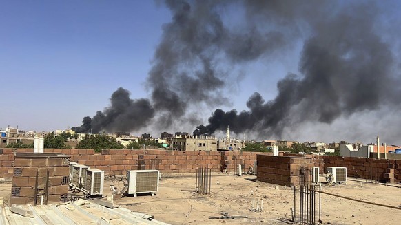 In this photo provided by Maheen S , smoke fills the sky in Khartoum, Sudan, near Doha International Hospital on Friday, April 21, 2023. The Muslim Eid al-Fitr holiday, typically filled with prayer, c ...