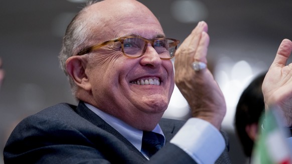 In this May 5, 2018 photo, Rudy Giuliani, an attorney for President Donald Trump, applauds at the Iran Freedom Convention for Human Rights and democracy at the Grand Hyatt in Washington. Giuliani’s de ...