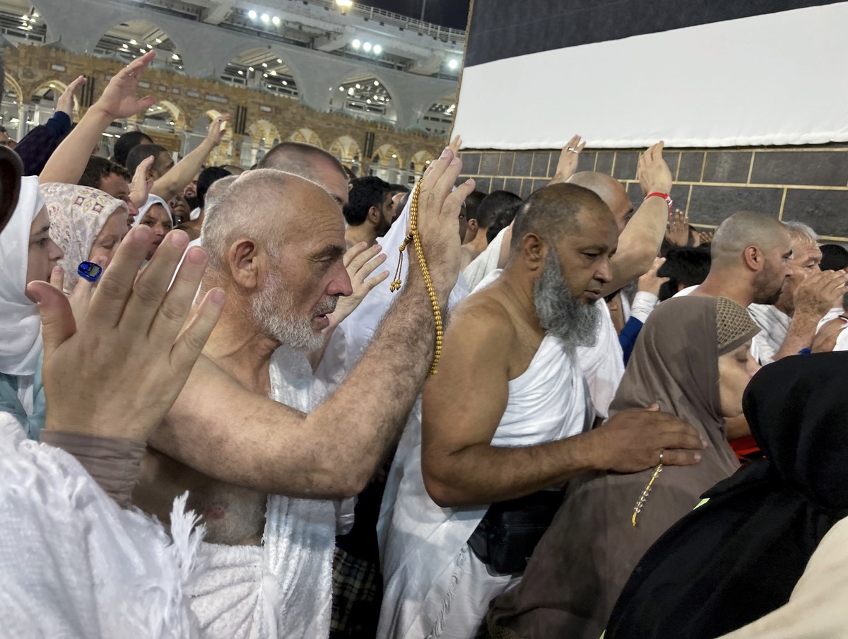 Muslim pilgrims circumambulate around the Kaaba, the cubic building at the Grand Mosque in the Saudi Arabia's holy city of Mecca, Tuesday, July 5, 2022. Saudi Arabia is expected to receive one mi ...