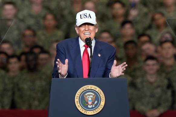 U.S. President Donald Trump speaks to the soldiers and servicemen during his visit to the USS George Washington at the U.S. Navy&#039;s Yokosuka base in Yokosuka, south of Tokyo, Tuesday, Oct. 28, 202 ...