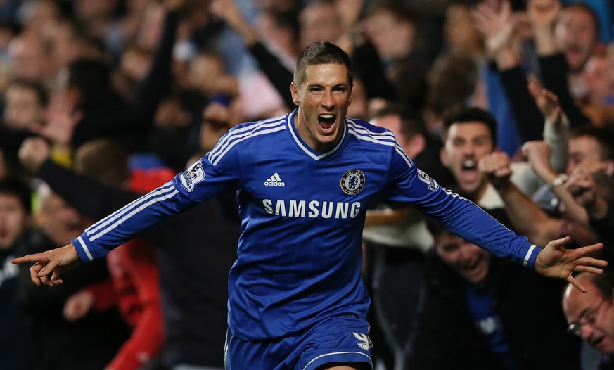 FILE - In this Sunday, Oct. 27, 2013, file photo, Chelsea&#039;s Fernando Torres celebrates after scoring the winning goal during the English Premier League soccer match between Chelsea and Manchester ...