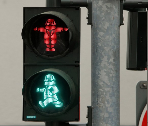 This traffic light in Trier, Germany with Karl Marx on it
https://www.reddit.com/r/mildlyinteresting/comments/jgitme/this_traffic_light_in_trier_germany_with_karl/