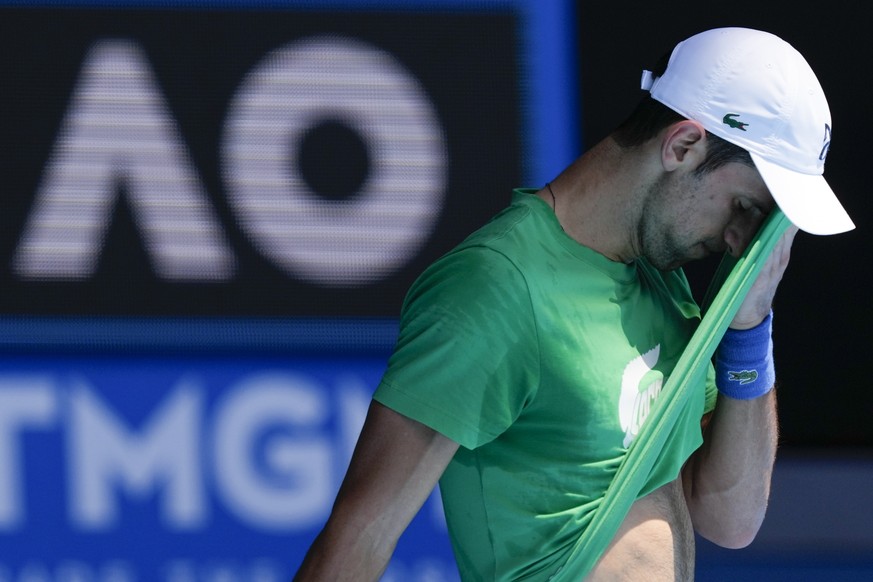 Defending men&#039;s champion Serbia&#039;s Novak Djokovic practices on Margaret Court Arena ahead of the Australian Open tennis championship in Melbourne, Australia, Thursday, Jan. 13, 2022. AP Photo ...