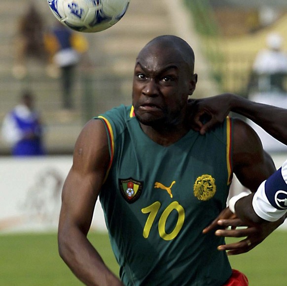 Cameroon&#039;s Patrick Mboma chases down a ball as his team advances to the quarterfinals in Sikasso, Mali, Tuesday Jan. 29, 2002. Cameroon defeated Togo 3-0 in the Africa Cup of Nations match. (AP P ...