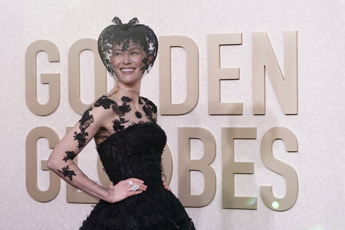 Rosamund Pike arrives at the 81st Golden Globe Awards on Sunday, Jan. 7, 2024, at the Beverly Hilton in Beverly Hills, Calif. (Photo by Jordan Strauss/Invision/AP)