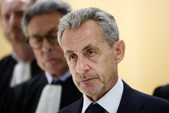 epa12404557 Former French president Nicolas Sarkozy leaves the courthouse in Paris, France, 25 September 2025. Sarkozy and twelve others, including three former ministers, stood trial for criminal con ...