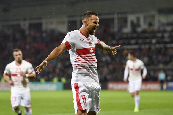 Swiss forward Haris Seferovic, celebrates after scoring the goal to the 0:1 during the 2018 Fifa World Cup group B qualifying soccer match Latvia against Switzerland at Skonto Stadium, in Riga, Latvia ...