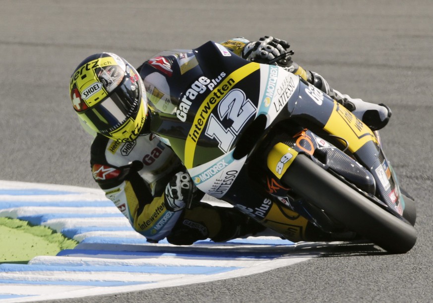 epa05586290 Swiss Moto2 rider Thomas Luethi of Garage Plus Interwetten in action during a free practice session prior to the official qualifying of the MotoGP Grand Prix of Japan at Twin Ring Motegi,  ...