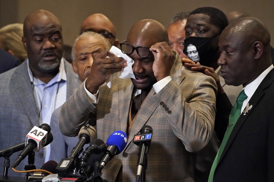 George Floyd's brother Philonise Floyd wipes his eyes during a news conference, Tuesday, April 20, 2021, in Minneapolis, after the verdict was read in the trial of former Minneapolis Police officer De ...