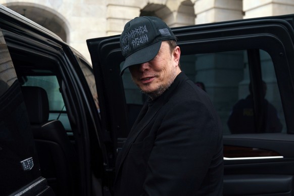 epa12219001 (FILE) - Businessman Elon Musk and his son leave the US Capitol in Washington, DC, USA, 21 May 2025 (re-issued 05 July 2025). Elon Musk on 05 July 2025 in a post on social media platform X ...