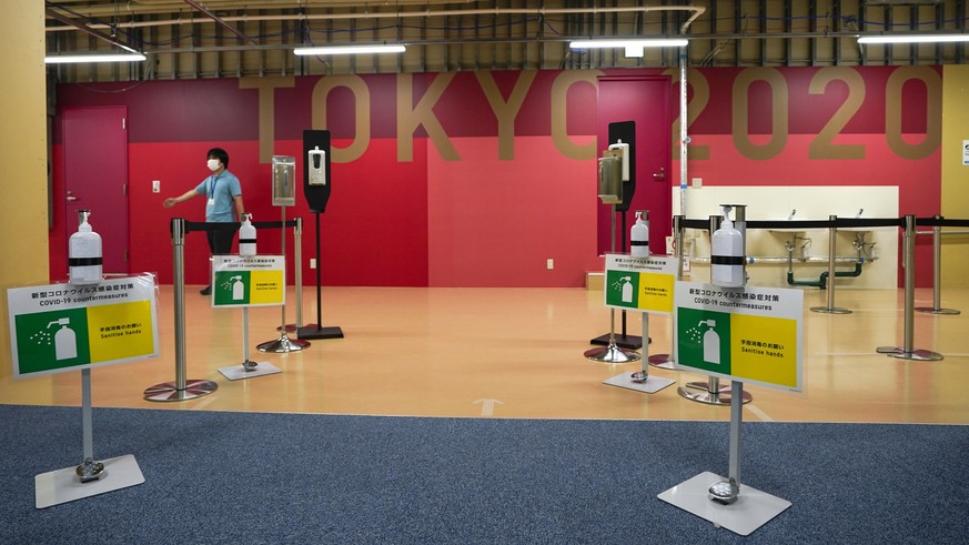 epa09288037 The entrance of the casual dining is seen during a press preview at the Olympic and Paralympic Village for the Tokyo 2020 Games, constructed in the Harumi waterfront district of Tokyo, Jap ...