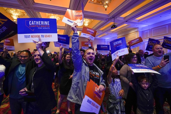 Supporters of Sen. Catherine Cortez Masto, D-Nev. react as she speaks during an election night party hosted by the Nevada Democratic Party, Tuesday, Nov. 8, 2022, in Las Vegas. (AP Photo/Gregory Bull)