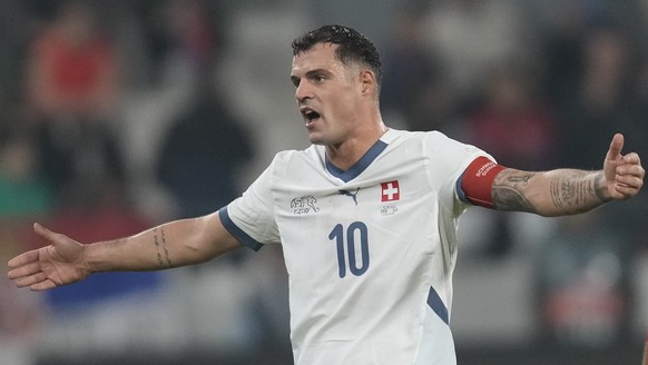 Switzerland&#039;s Granit Xhaka reacts during the UEFA Nations League soccer match between Serbia and Switzerland at the Dubocica Stadium in Leskovac, Serbia, Saturday, Oct. 12, 2024. (AP Photo/Darko  ...