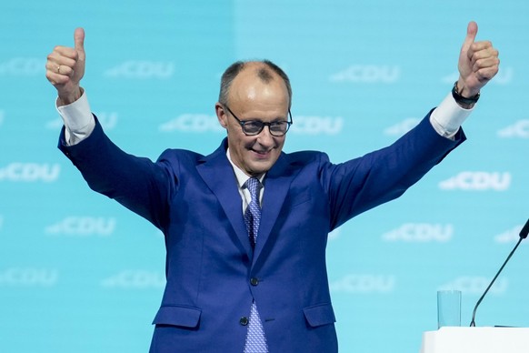 Friedrich Merz, CDU candidate for chancellor and CDU federal chairman,celebrates after his speech at the 37th federal party conference of the CDU in Berlin, Germany, Monday, Feb.3, 2025. (AP Photo/Ebr ...