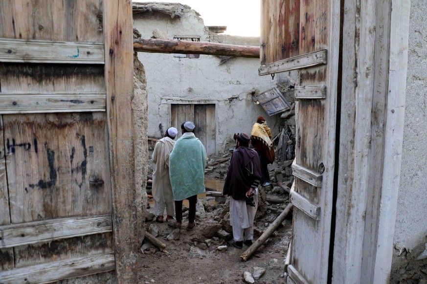 epa10028875 People affected by earthquake wait for relief in Gayan village in Paktia province, Afghanistan, 23 June 2022. More than 1,000 people were killed and over 1,500 others injured after a 5.9 m ...