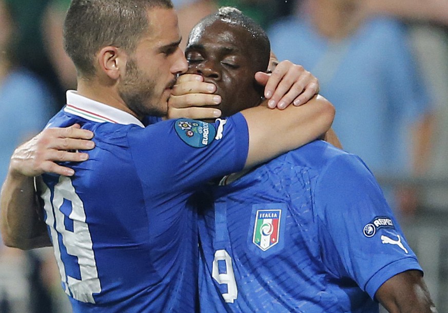 Italy&#039;s Mario Balotelli, right, celebrates with Leonardo Bonucci after scoring his side&#039;s second goal during the Euro 2012 soccer championship Group C match between Italy and the Republic of ...