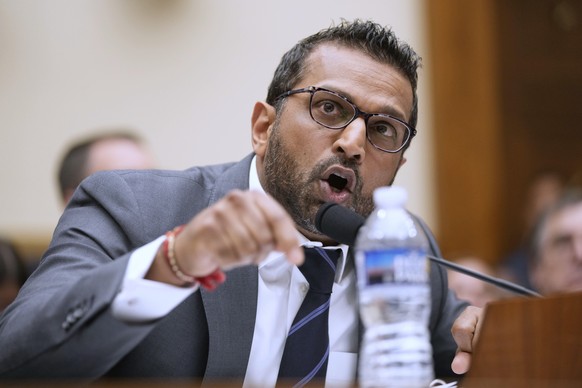 FBI Director Kash Patel speaks to Rep. Eric Swalwell, D-Calif., as Patel appears before the House Judiciary Committee, on Capitol Hill in Washington, Wednesday, Sept. 17, 2025. (AP Photo/Mark Schiefel ...