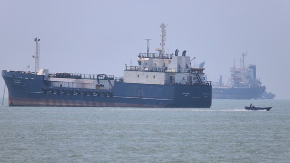 A small motorboat passes anchored vessels in the Strait of Hormuz off Bandar Abbas, Iran, Wednesday, June 17, 2026.(Amirhosein Khorgooi/ISNA via AP)
Iran War Strait of Hormuz