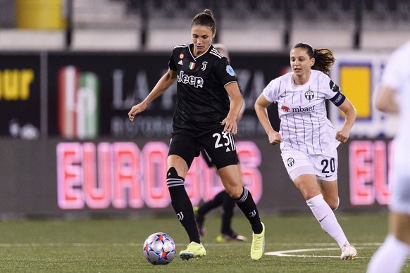 SCHAFFHAUSEN, SWITZERLAND - OCTOBER 19: Cecilia Salvai of Juventus L is chased by Fabienne Humm of FC Zurich R during the UEFA Women s Champions League group C match between FC Zrich and Juventus at W ...