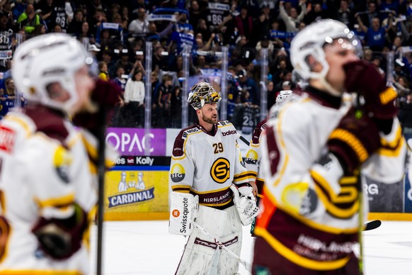 The goaltender Robert Mayer (GSHC) #29 and his teammates look disappointed after losing against Fribourg-Gotteron, during the fifth leg of the National League semifinal playoff game of the Swiss Champ ...