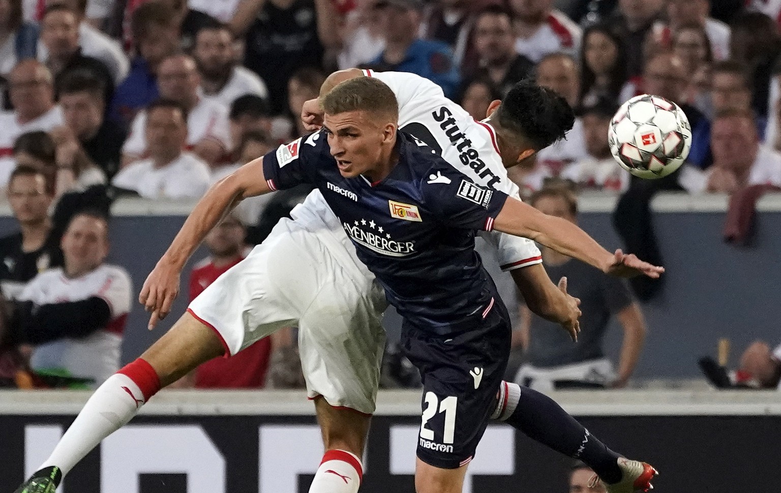 epa07595375 Stuttgart&#039;s Nicolas Gonzales (R) in action against Union&#039;s Grischa Proemel (L) during the German Bundesliga relegation play-off first leg soccer match between VfB Stuttgart and F ...