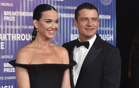 Katy Perry, left, and Orlando Bloom arrive at the tenth Breakthrough Prize Ceremony on Saturday, April 13, 2024, at the Academy Museum of Motion Pictures in Los Angeles. (Photo by Jordan Strauss/Invis ...