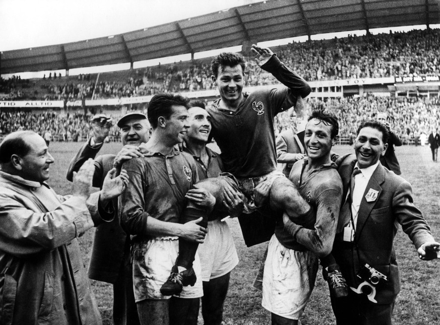 1958 World Cup 3rd Place Playoff France v West Germany Just Fontaine of France is carried by his team mates (L-R) Yvon Douis, Andre Lerond and Jean Vincent after scoring four goals against West German ...