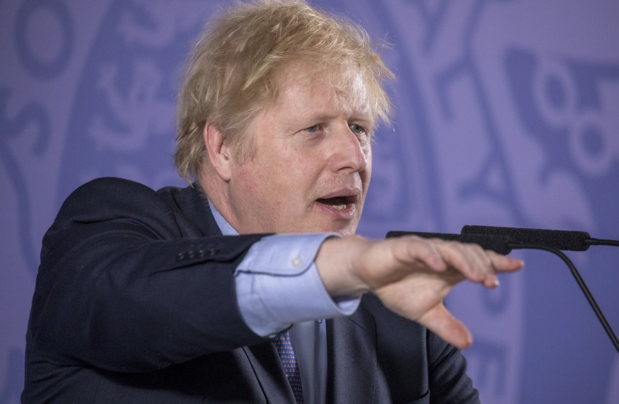 epa08190332 British Prime Minister Boris Johnson gestures as he delivers a speech on &#039;Unleashing Britain&#039;s Potential&#039; at the Old Royal Naval College in London, Britain, 03 February 2020 ...