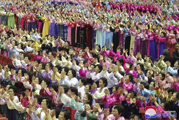 This photo provided by the North Korean government, North Korean women attend the National Mothers? Meeting in Pyongyang, North Korea on Dec. 3, 2023. Independent journalists were not given access to  ...