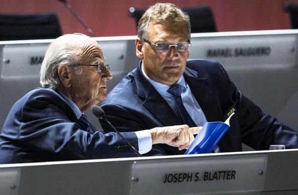 epa05099585 (FILE) A file picture dated 29 May 2015 of FIFA President Joseph Blatter (L) speaking with FIFA Secretary General Jerome Valcke (R) during the 65th FIFA Congress in Zurich, Switzerland. Me ...