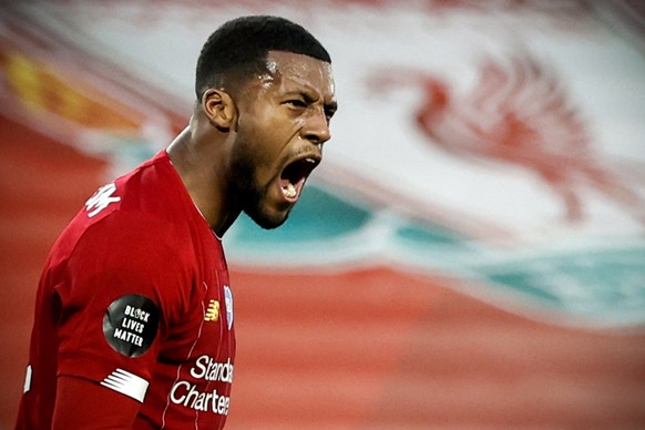 epa08561202 Liverpool&#039;s Georginio Wijnaldum celebrates after scoring the 3-0 lead during the English Premier League soccer match between Liverpool FC and Chelsea FC in Liverpool, Britain, 22 July ...