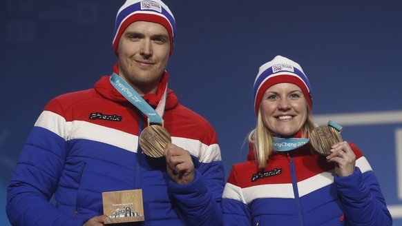 Mixed doubles curling bronze medalists Kristin Skaslien, right, and Magnus Nedregotten, of Norway, pose during their medals ceremony at the 2018 Winter Olympics in Pyeongchang, South Korea, Saturday,  ...