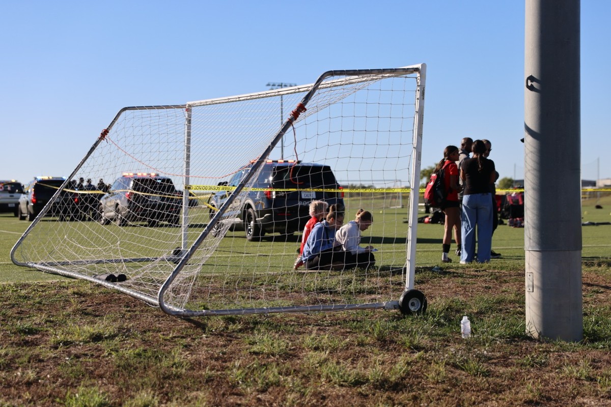 This image provided by KAKE shows police on the scene where a person drove a vehicle through a soccer field during a game in Wichita, Kansas, Saturday, Oct. 17, 2026. (Wyatt Glosson/KAKE via AP) === M ...