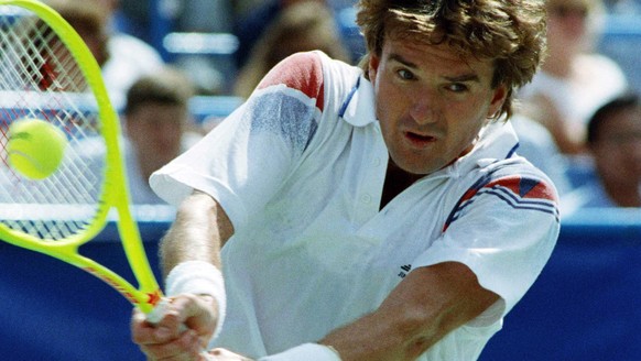 FILE - In this Sept. 2, 1991, file photo, Jimmy Connors returns a backhand during a fourth round match against Aaron Krickstein at the U.S. Open tennis tournament in New York. Connors changed tennis&# ...