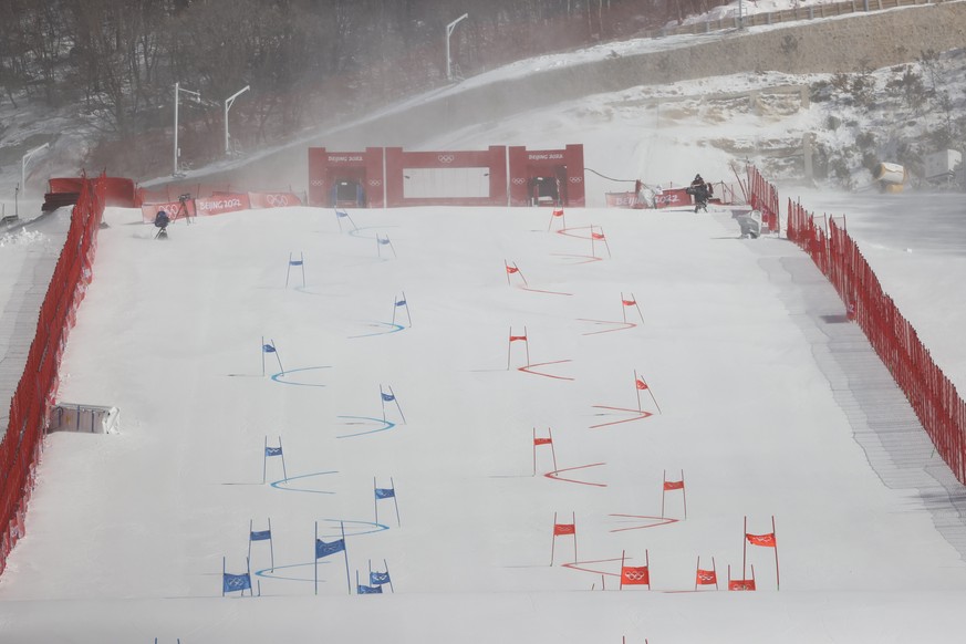 epa09770576 General view of the slope as wind delays the Alpine Skiing Team event of the Beijing 2022 Olympic Games at the Yanqing National Alpine Ski Centre Skiing, Beijing municipality, China, 19 Fe ...