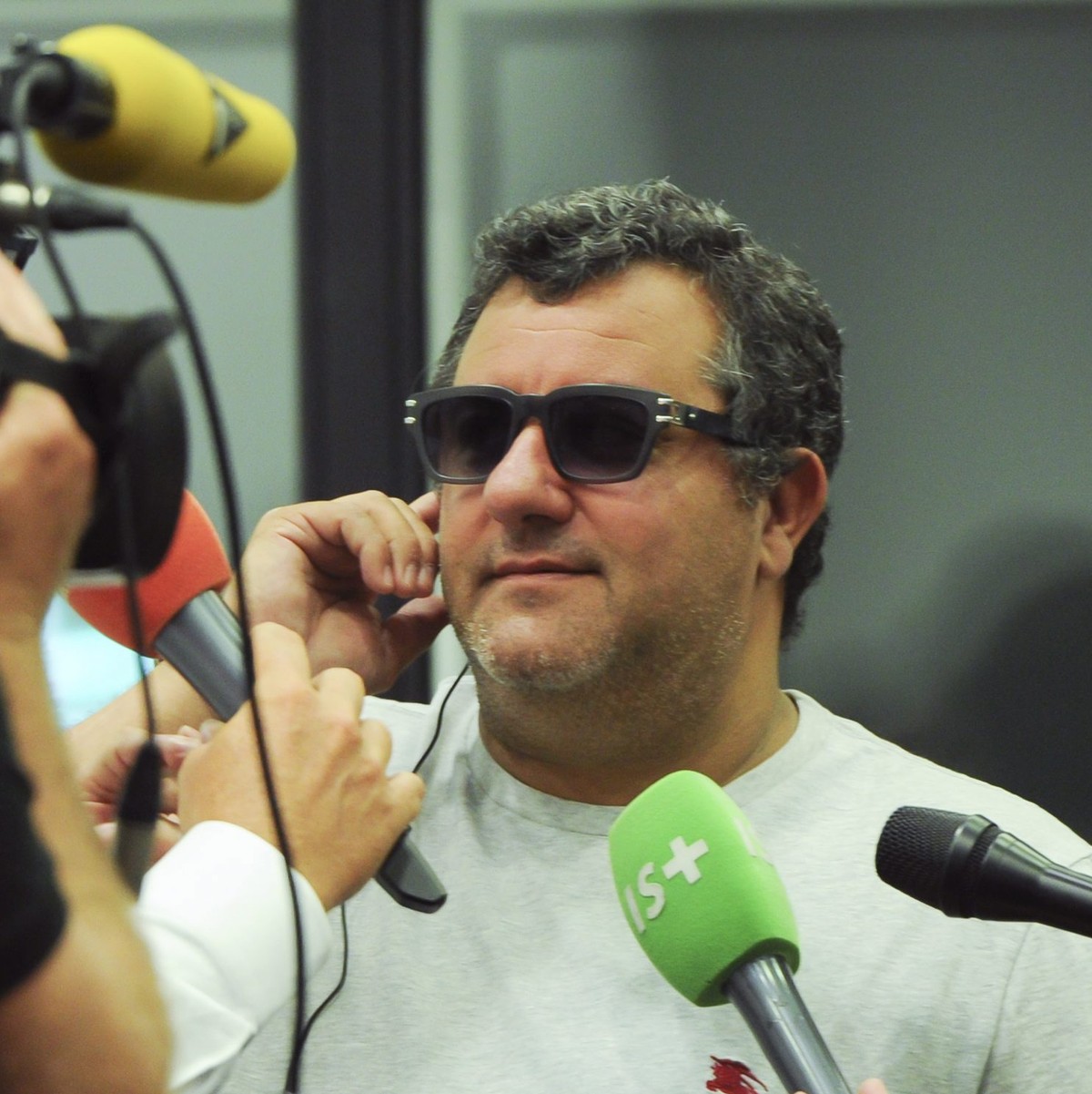 epa05520257 Italian sports agent Mino Raiola attends the press conference of his player OGC Nice's French Milan's Italian forward Mario Balotelli at the Allianz Riviera stadium in Nice, sout ...