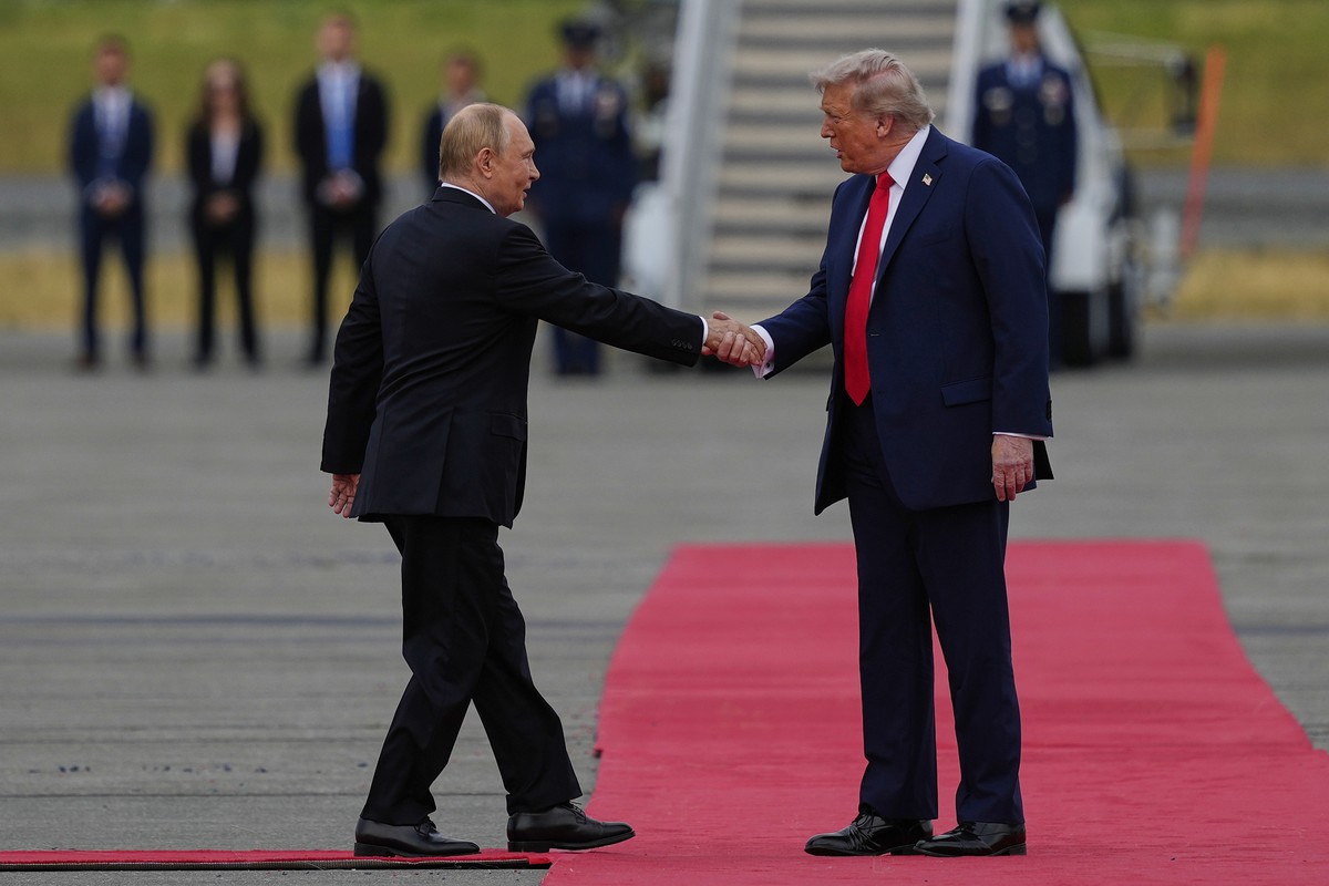 KEYPIX - President Donald Trump greets Russia's President Vladimir Putin Friday, Aug. 15, 2025, at Joint Base Elmendorf-Richardson, Alaska. (AP Photo/Julia Demaree Nikhinson)