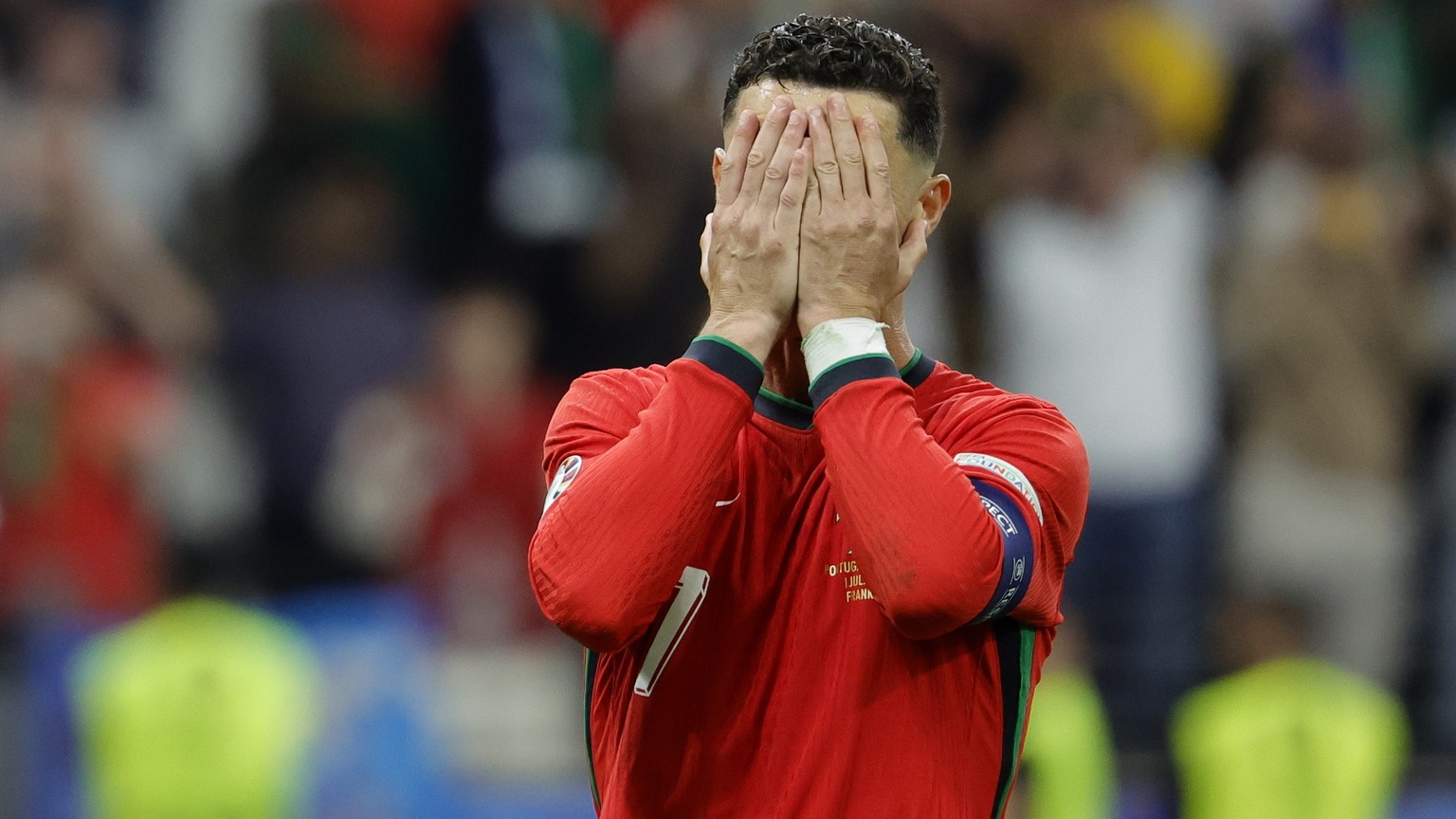 epa11451284 Cristiano Ronaldo of Portugal reacts after failing to score from the penalty spot during extra time of the UEFA EURO 2024 Round of 16 soccer match between Portugal and Slovenia, in Frankfu ...
