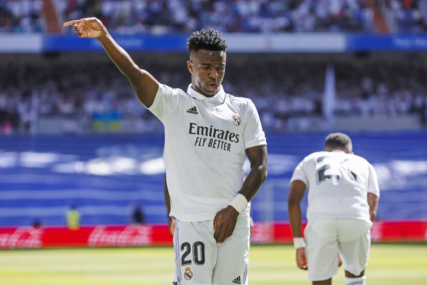 Real Madrid&#039;s Vinicius Junior celebrates after scoring the opening goal during a Spanish La Liga soccer match between Real Madrid and Betis at the Santiago Bernabeu stadium in Madrid, Spain, Satu ...