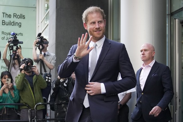 FILE - Prince Harry leaves the High Court after giving evidence in London, June 7, 2023. Prince Harry won the phone hacking lawsuit on Friday.  15, 2023 against the publisher of the Daily Mirror and…