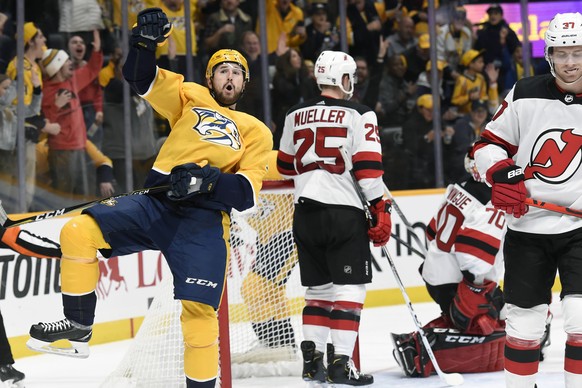 Nashville Predators left wing Filip Forsberg (9), of Sweden, celebrates after scoring against the New Jersey Devils during the second period of an NHL hockey game Saturday, Dec. 7, 2019, in Nashville, ...