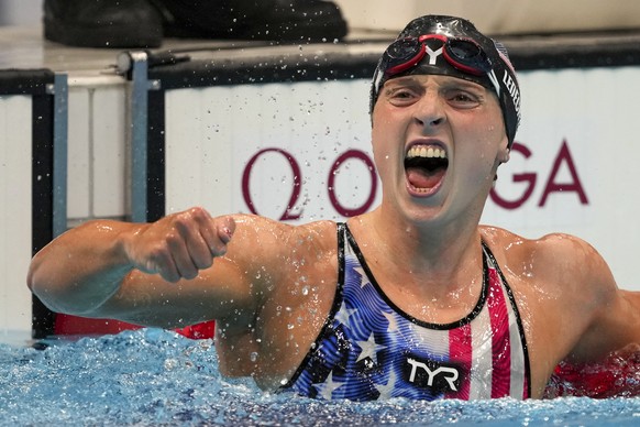 Katie Ledecky, of the United States, reacts after winning the women&#039;s 1500-meters freestyle final at the 2020 Summer Olympics, Wednesday, July 28, 2021, in Tokyo, Japan. (AP Photo/Matthias Schrad ...
