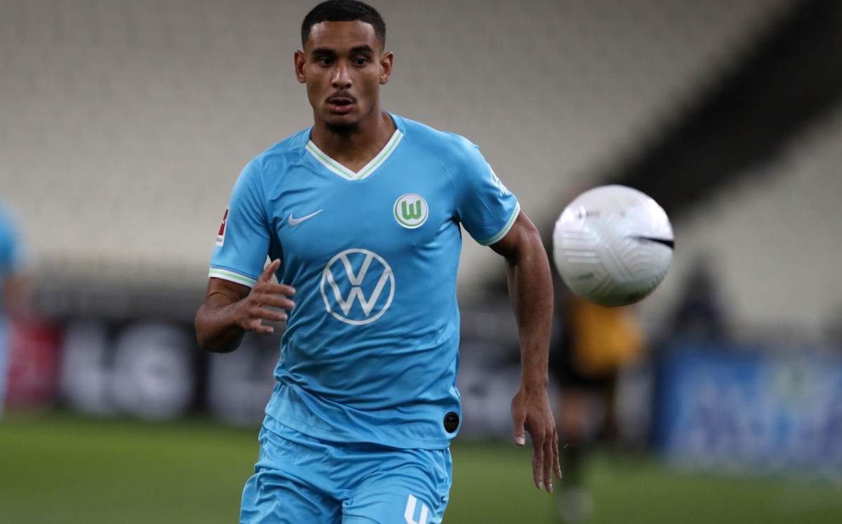 Wolfsburg's Maxence Lacroix goes for the ball during the Europa League playoff soccer match between AEK Athens and VfL Wolfsburg at the Olympic stadium in Athens, Thursday, Oct. 1, 2020. (AP Phot ...